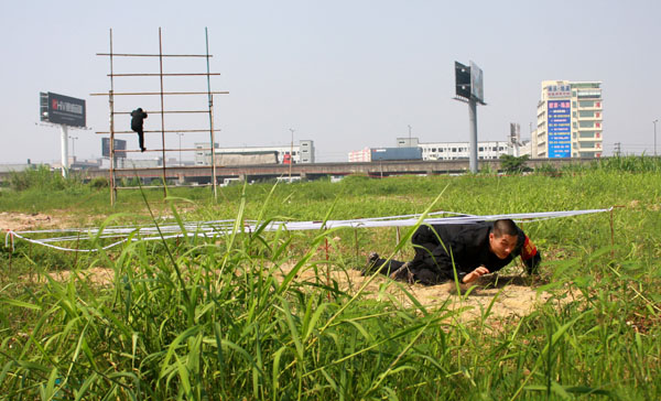 增強(qiáng)隊伍素質(zhì) 力保一方平安——中亞集團(tuán)保安部舉行2010崗位大點(diǎn)兵活動